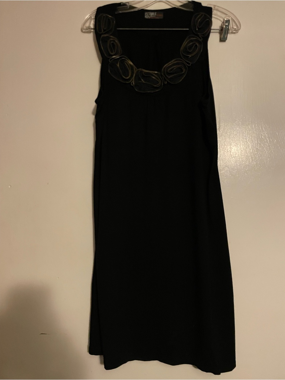 Elegant Black Sleeveless Dress with Floral-Trim Neckline